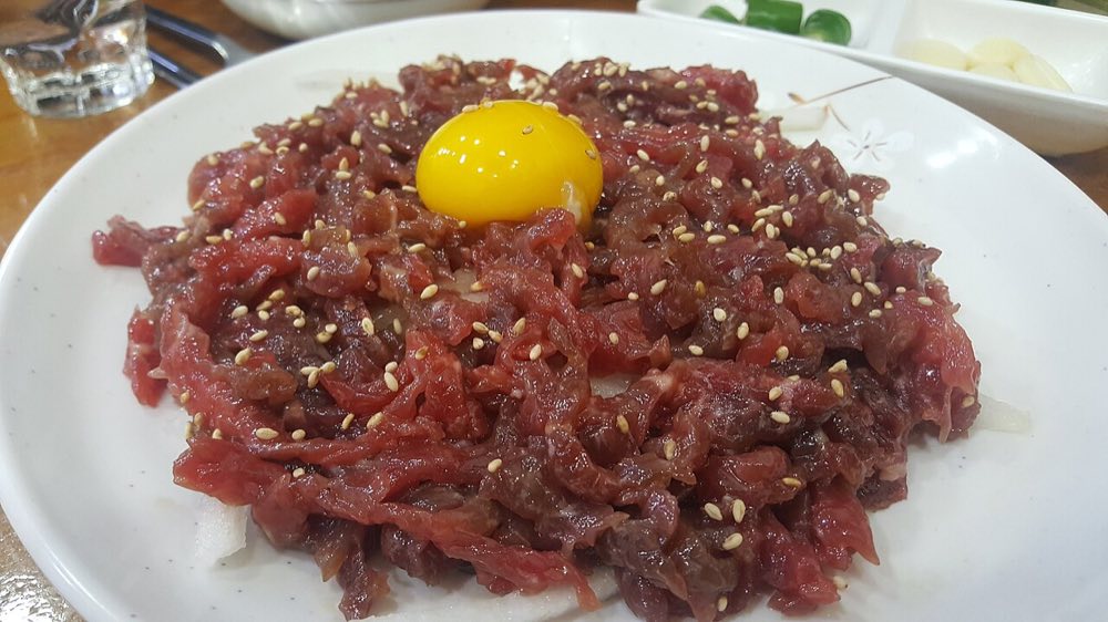 Yukhoe, Korean raw beef tartare served at the dedicated yukhoe alley inside Gwangjang Market