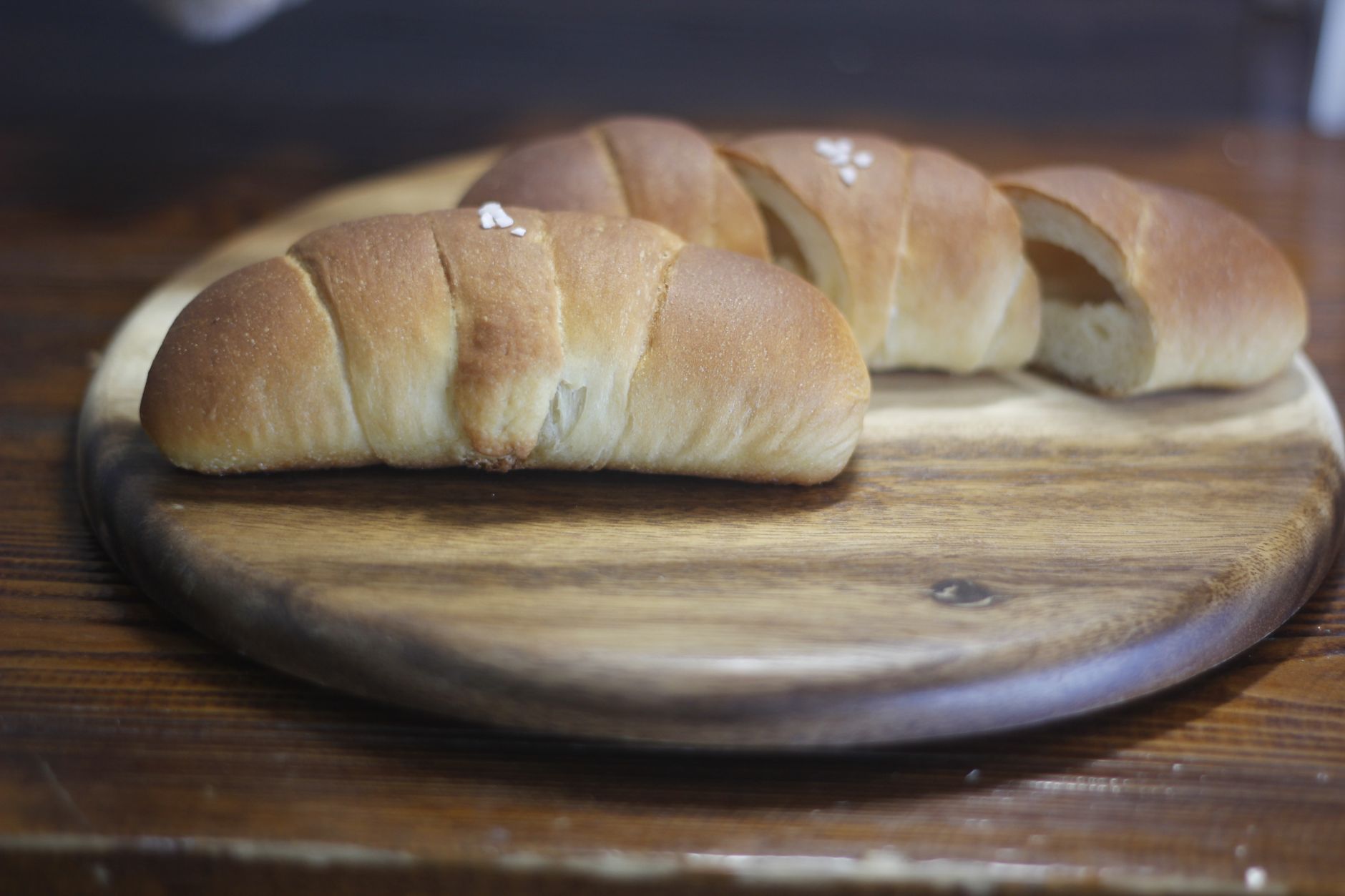 Fresh salt bread pastries at a Korean bakery, similar to the salt bread served at Mong Ted café in Suwon
