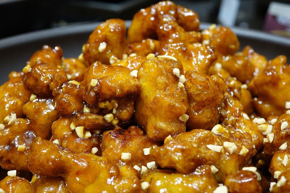 Dakgangjeong sweet and spicy Korean fried chicken popular at Mangwon Market