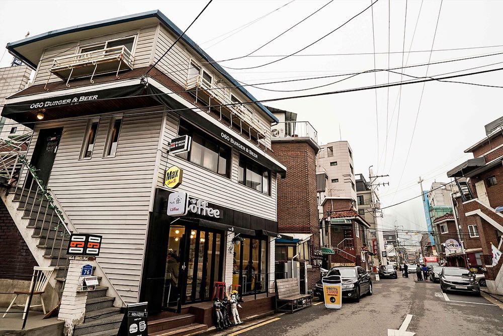 Cafes and shops on Mangnidan-gil street near Mangwon Market in Seoul