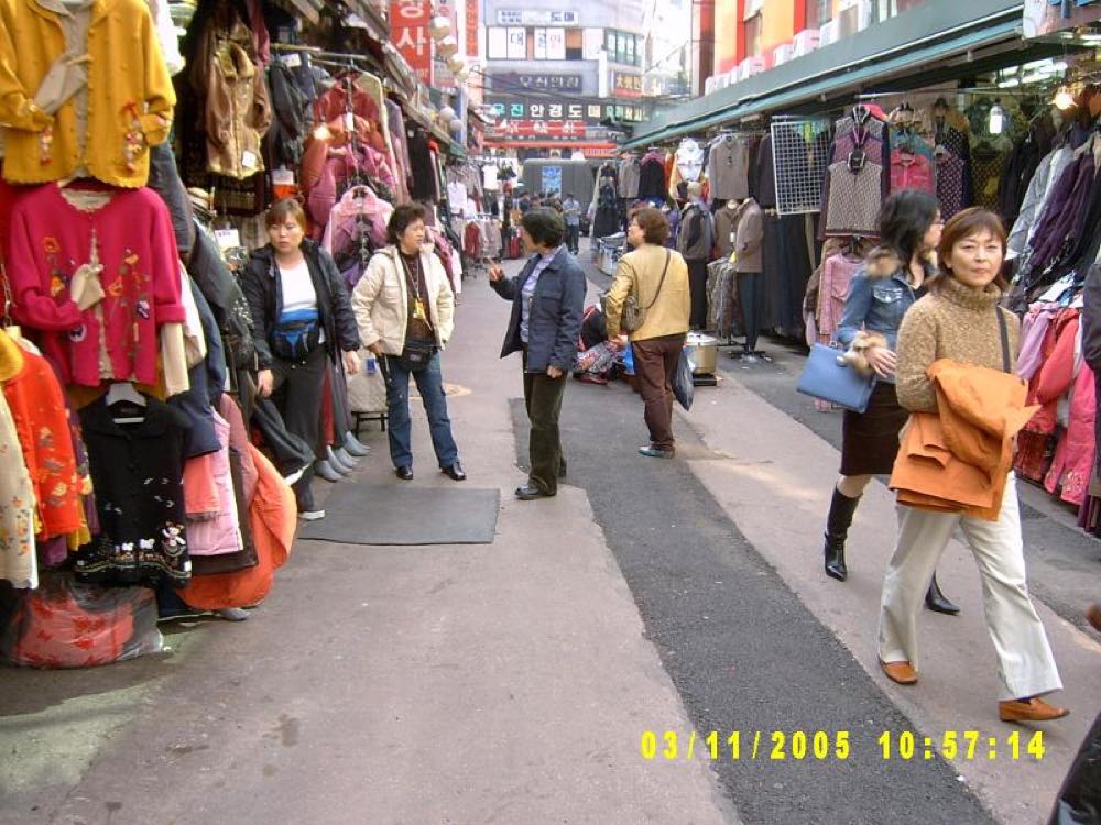 Busy shopping alley in Namdaemun Market Seoul